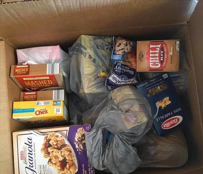 a cardboard box with food